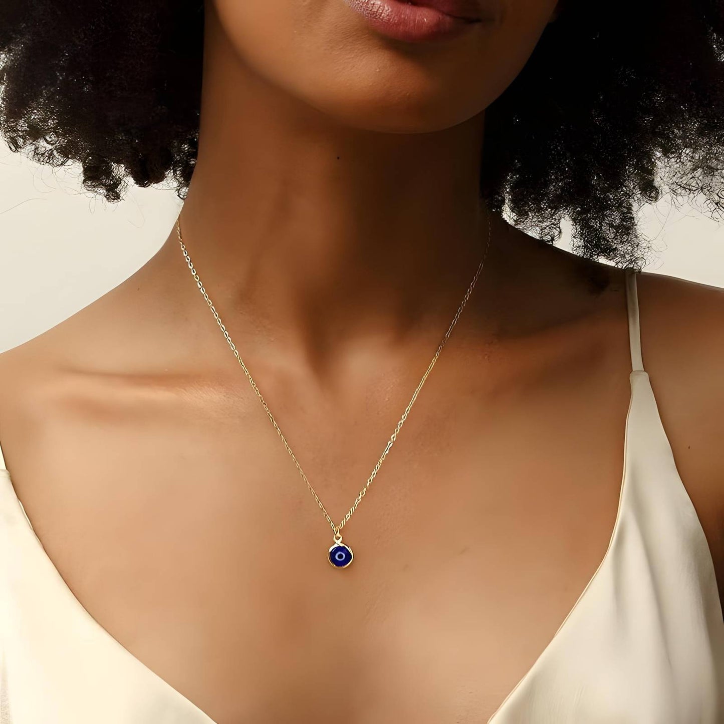 Ellis is a 18k AAA gold plated evil eye charmed necklace