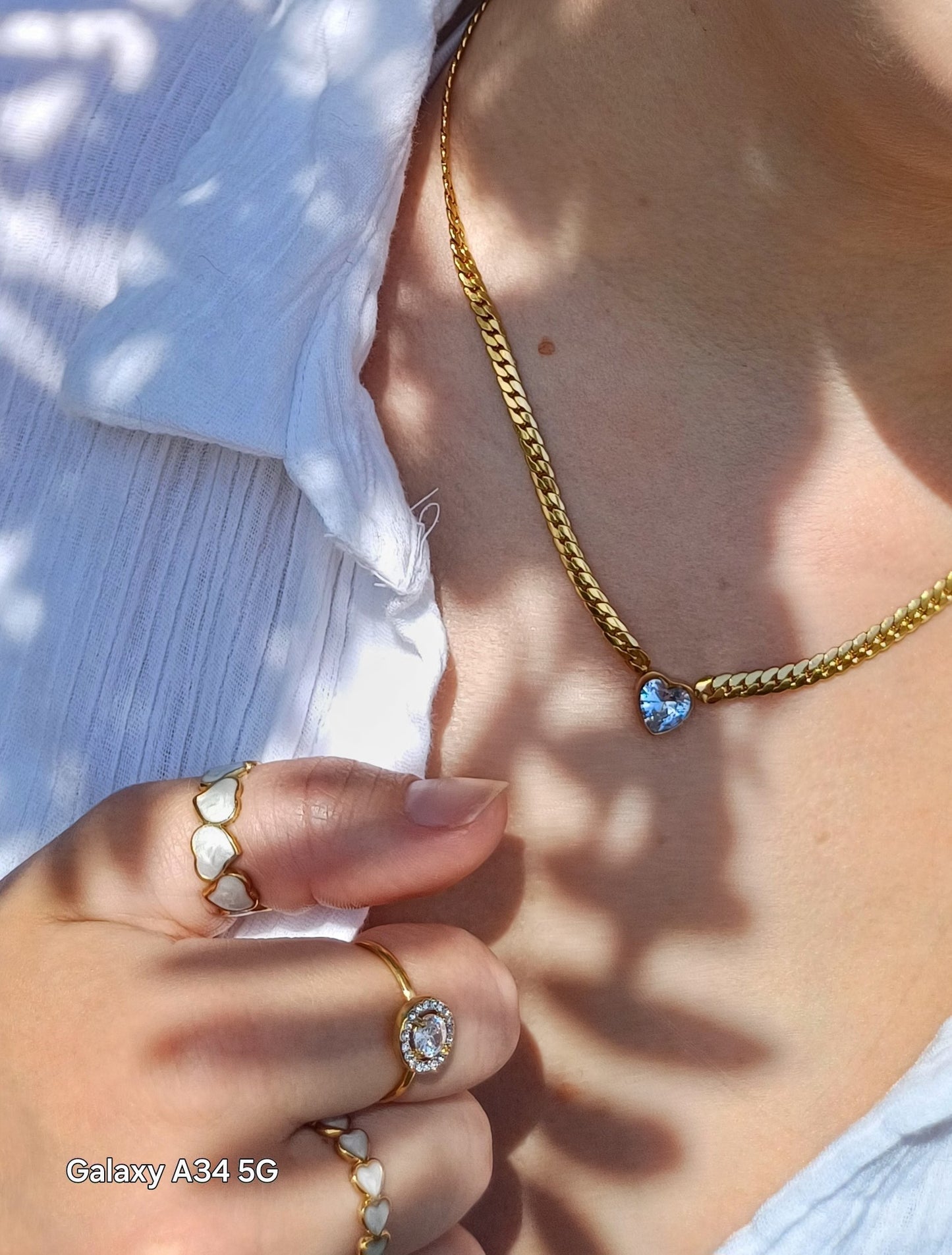 Bonnie 18K AAA plated gold curb chain with a heart shape zircon charm