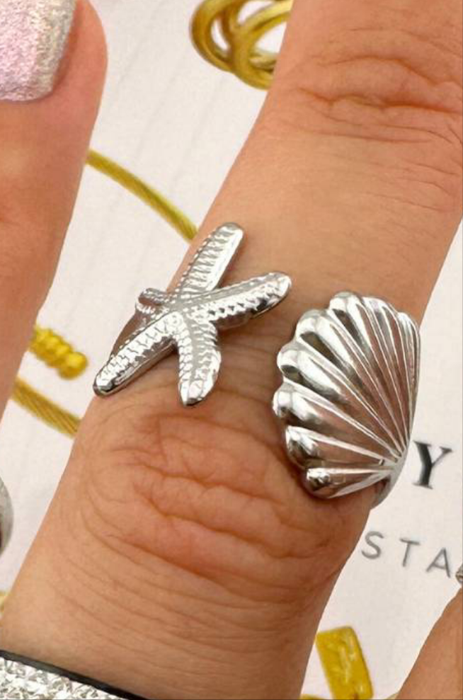 cove is a adjustable silver starfish and shell ring