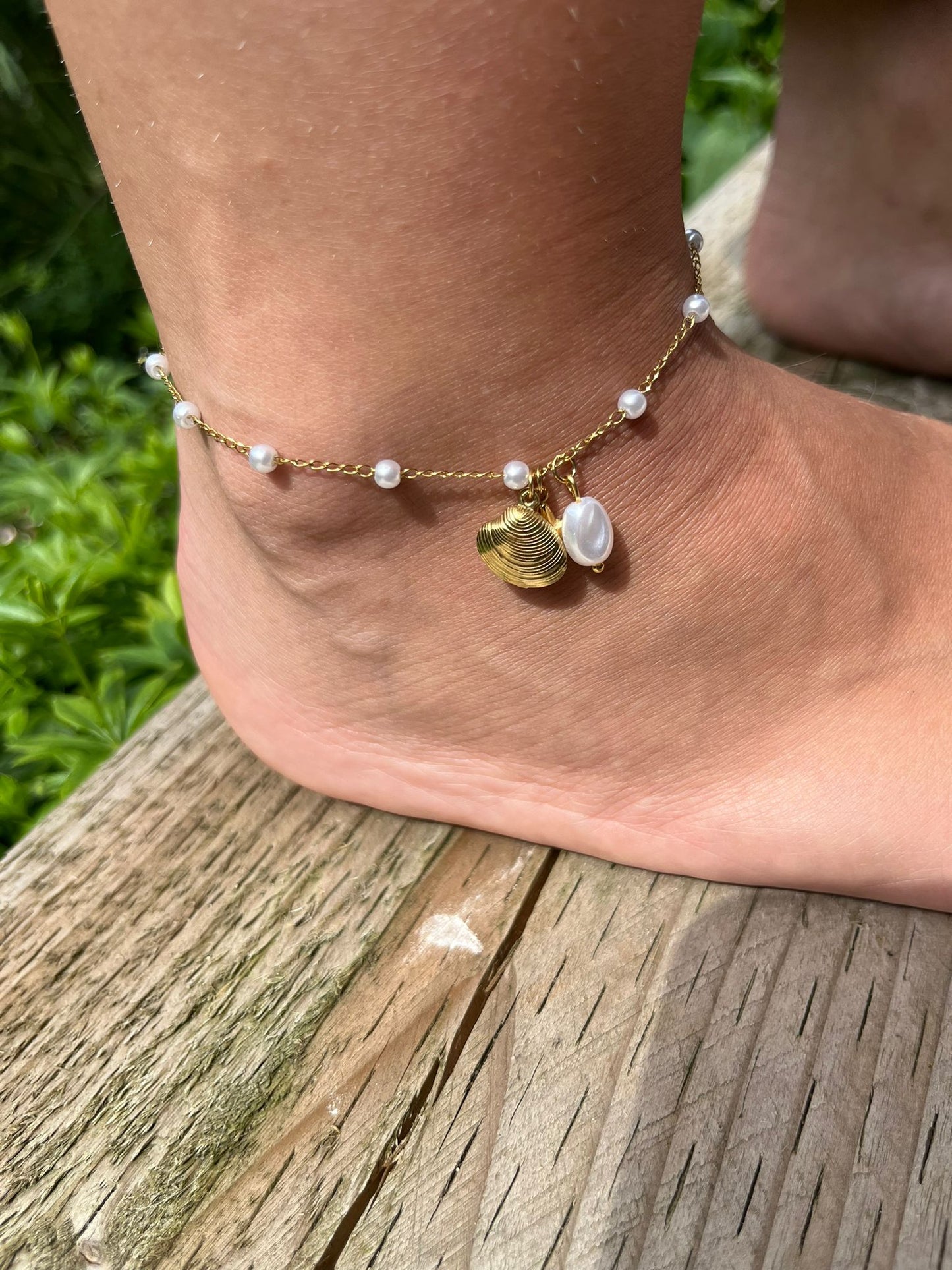 Karter is a 18k AAA gold plated Anklet with a shell, star and pearl charms