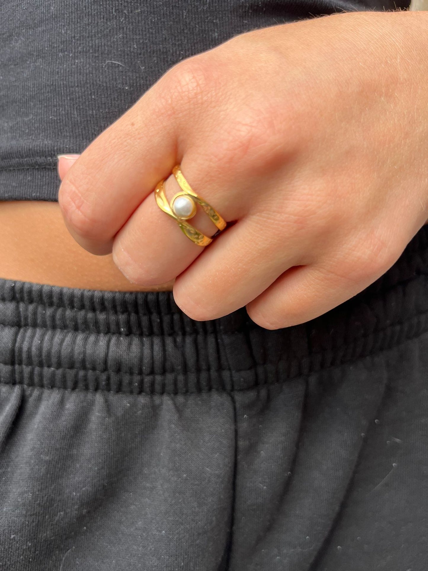 Everlee is a 18k AAA gold plated adjustable ring with a pearl gem at the centre