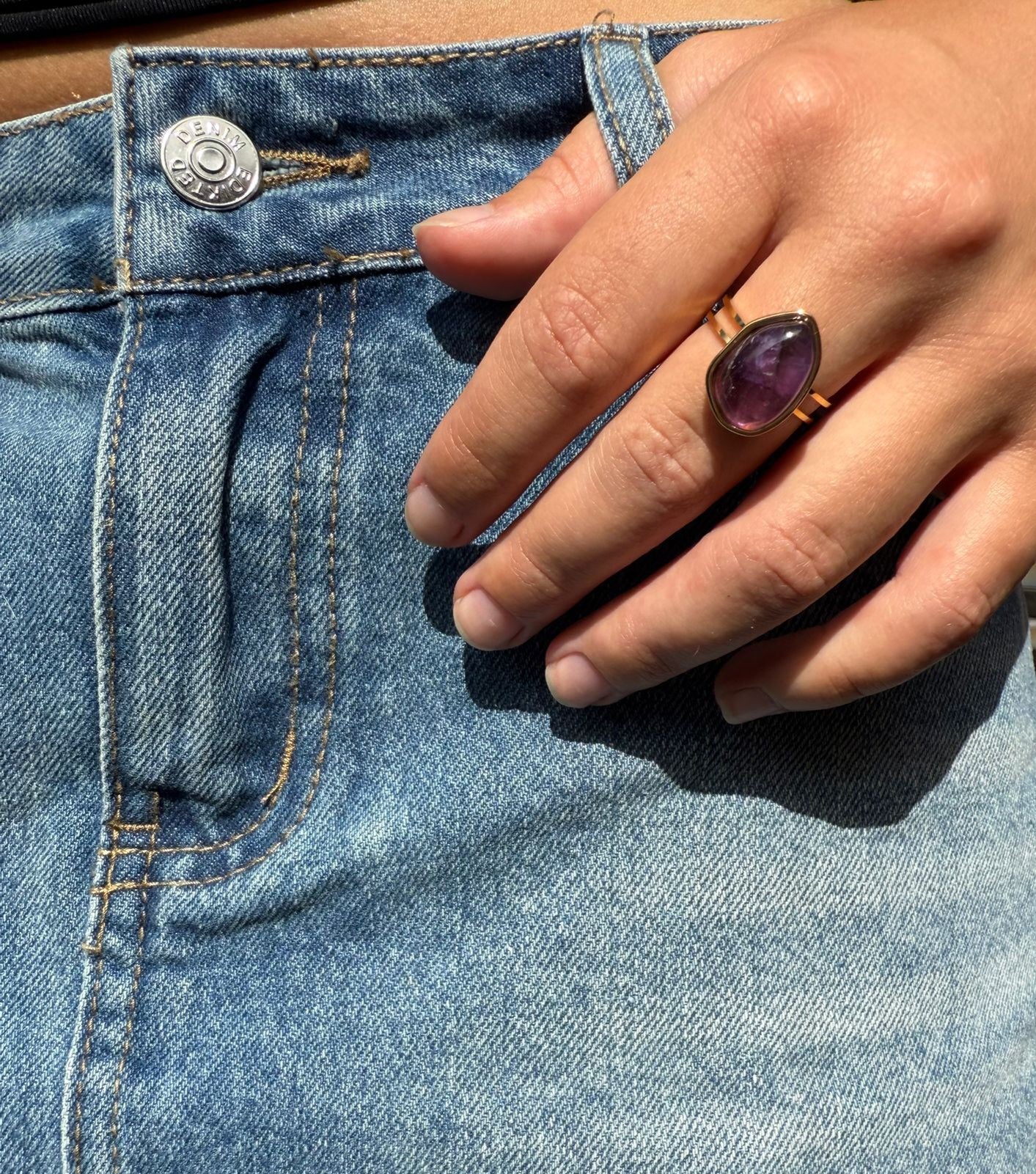 Charlie is a 18k AAA gold plated adjustable ring with a main purple crystal
