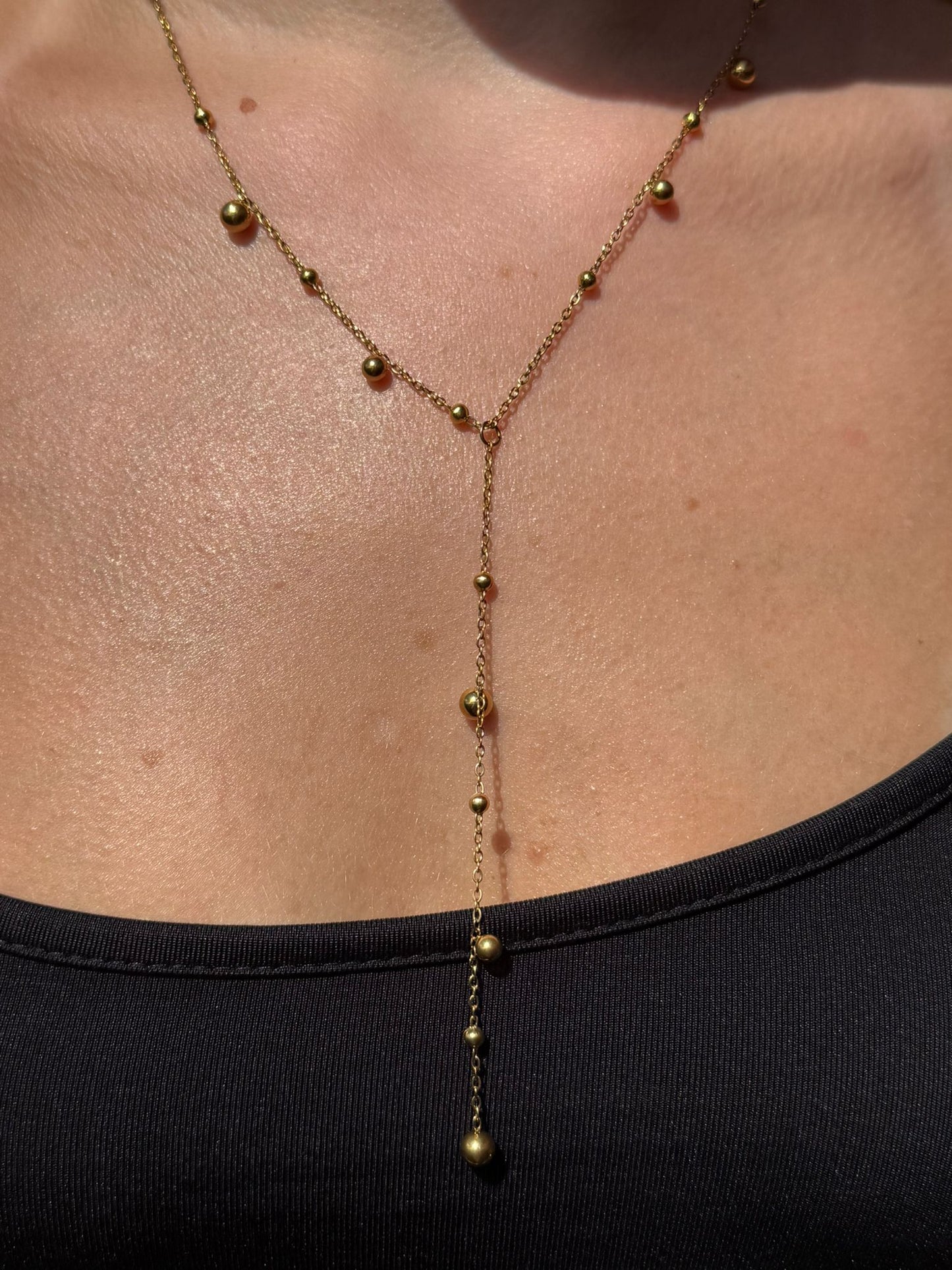 Delphine is a 18k AAA gold plated chain with small beads on