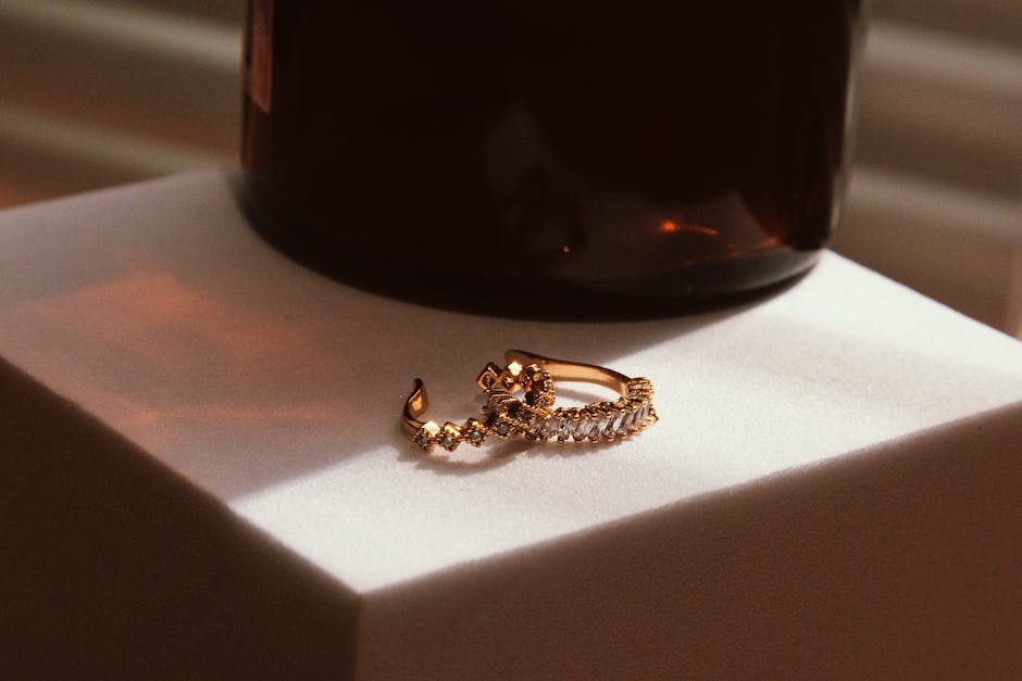 Close-up of luxurious gold rings showcasing intricate design and texture, capturing elegance and sophistication.