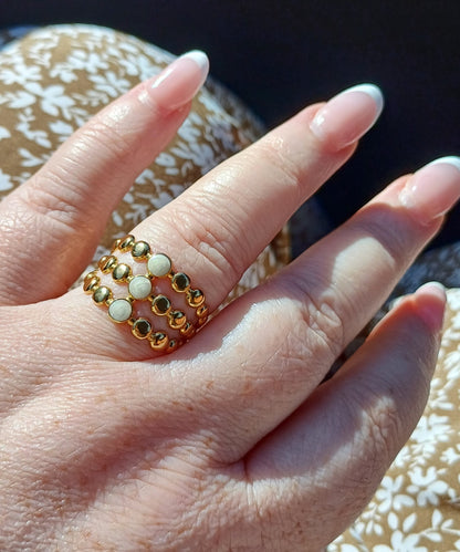 Evelyn is a three tiered 18K AAA gold plated  ring with gold and white bead design