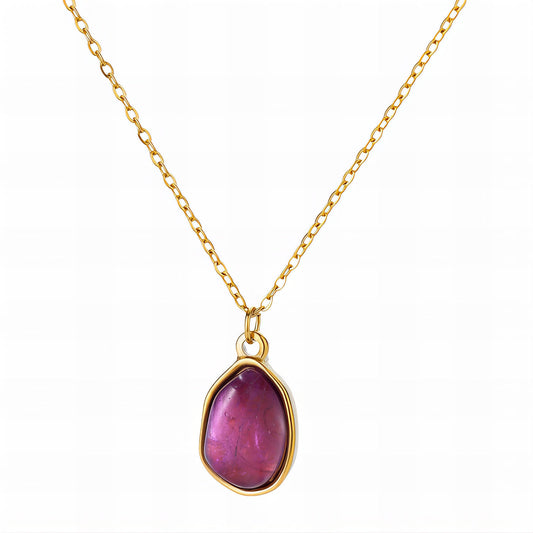 Charlie is a 18k AAA gold plated chain necklace with a purple crystal inlayed gem