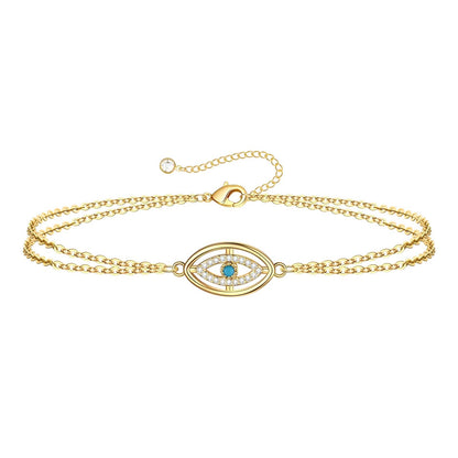 Edie is a 18K AAA gold plated two chain evil eye charm with zirconia diamond bracelet