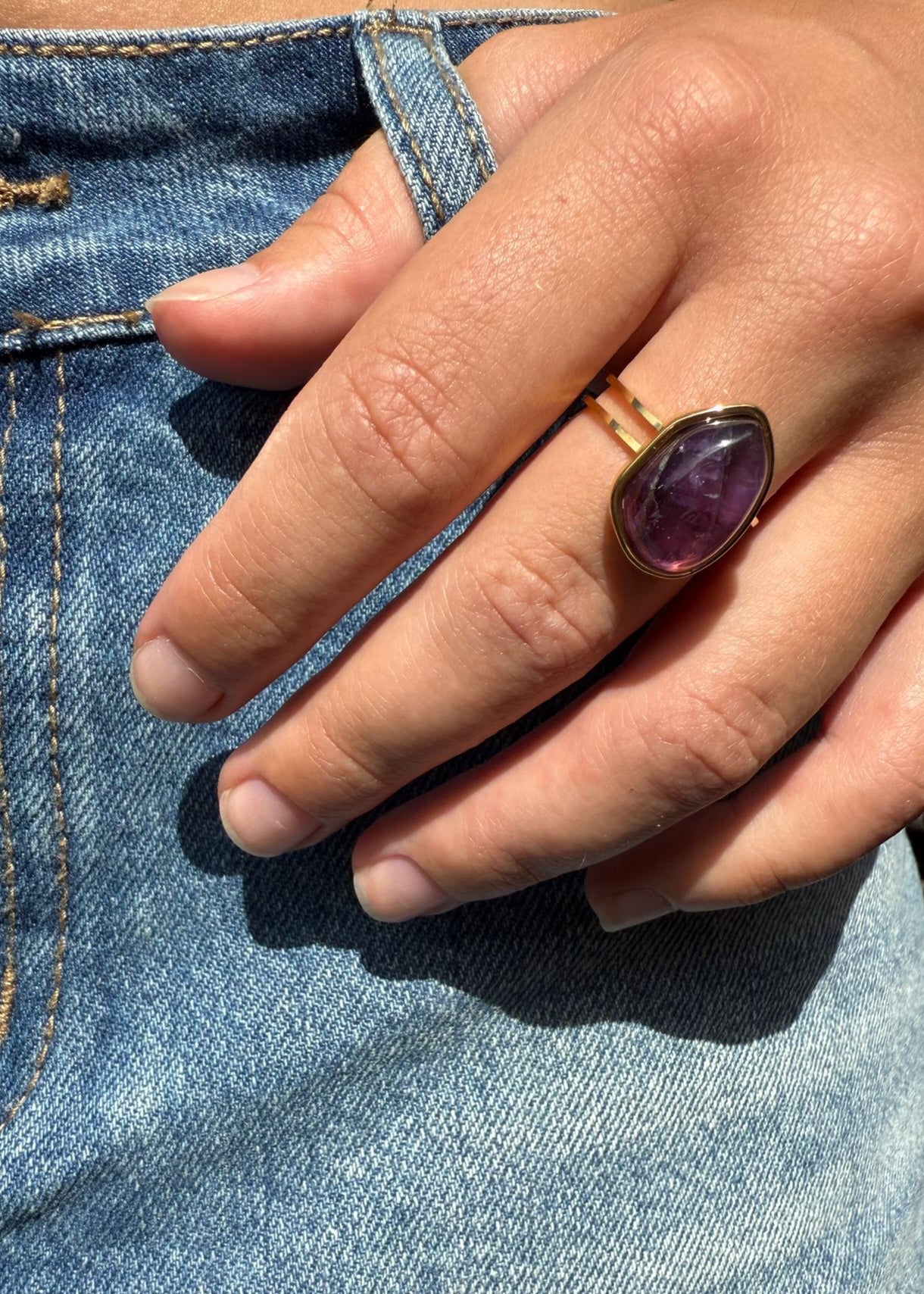 Charlie is a 18k AAA gold plated adjustable ring with a main purple crystal