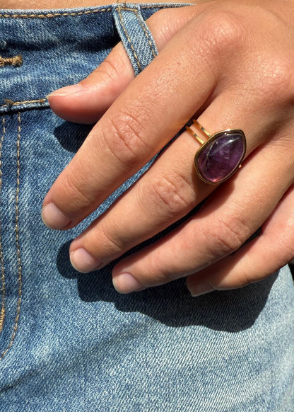 Charlie is a 18k AAA gold plated adjustable ring with a main purple crystal
