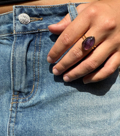 Charlie is a 18k AAA gold plated adjustable ring with a main purple crystal