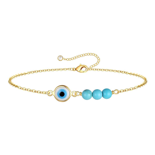 Imogen is an 18k AAA gold plated evil eye charm chain with aqua beads