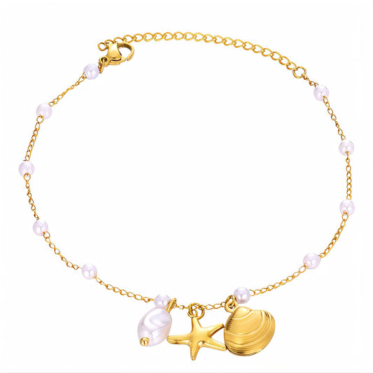 Karter is a 18K AAA gold plated bracelet with a shell, star and pearl charms