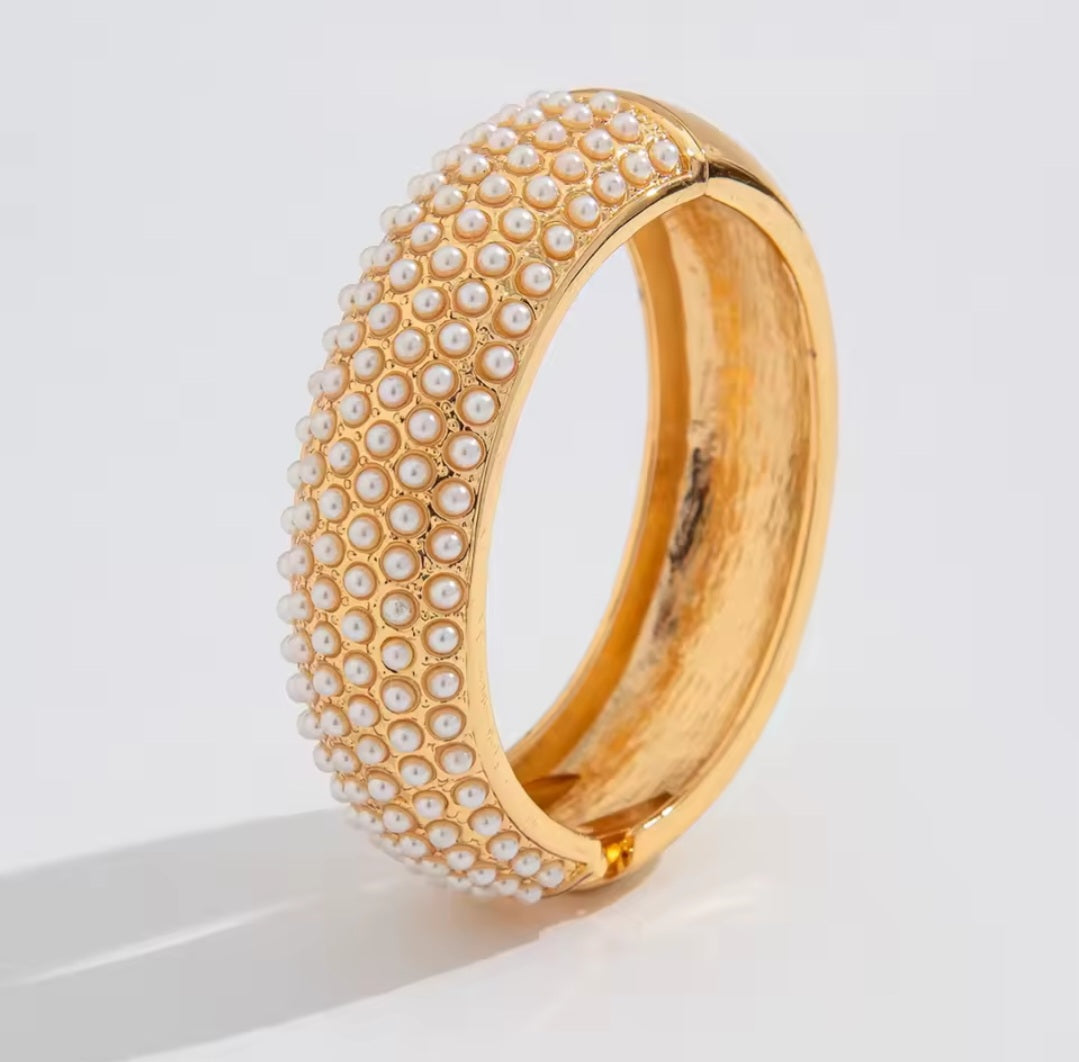 Ingrid gold bangle with 6 rows of pearls
