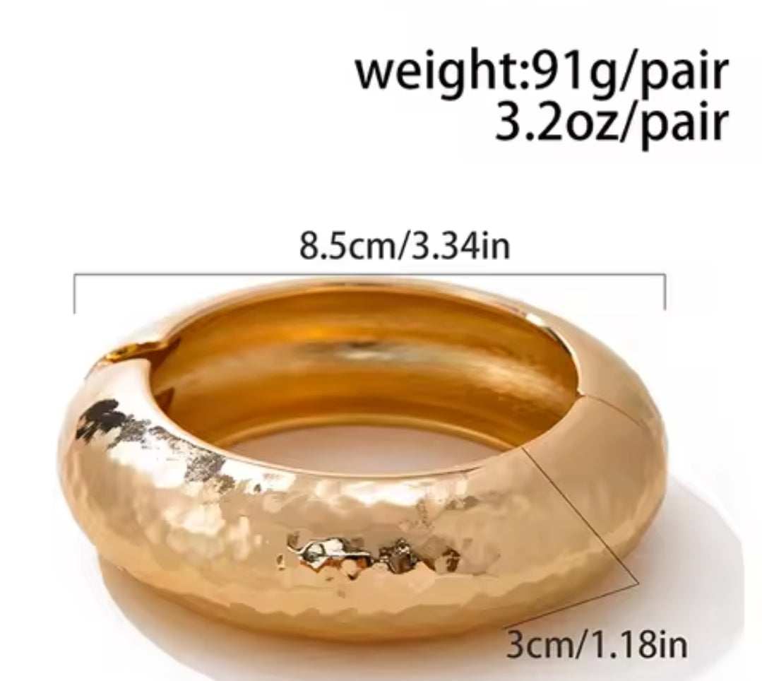 Miriam is a gold plated dimple effect bangle