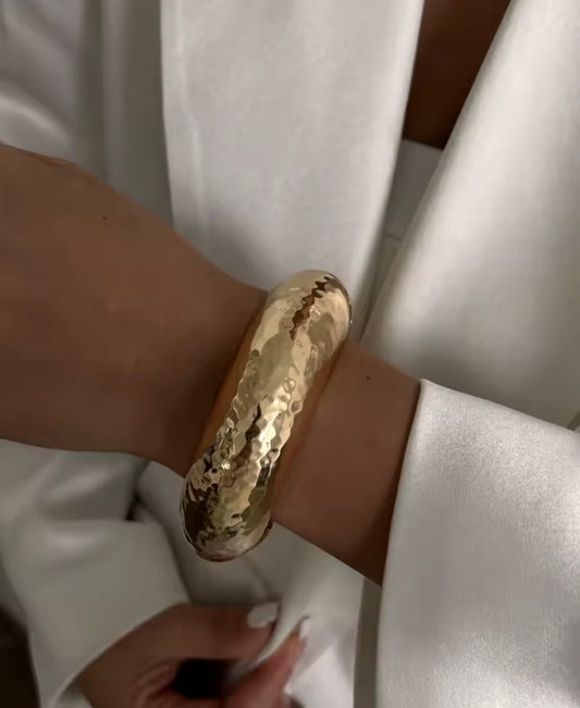 Miriam is a gold plated dimple effect bangle