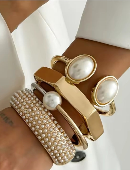 Ingrid gold bangle with 6 rows of pearls