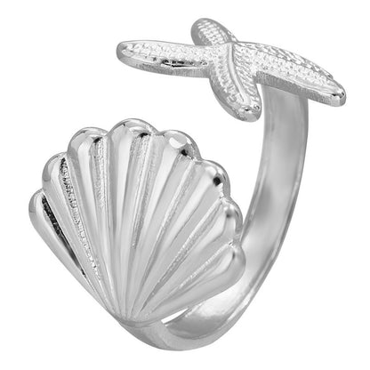 cove is a adjustable silver starfish and shell ring