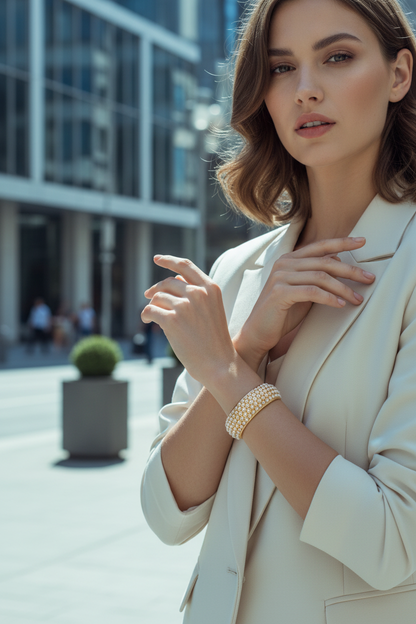 Model in urban setting wearing Ingrid bangle