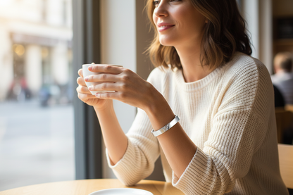 Woman in her 30s wearing Bella Bangle